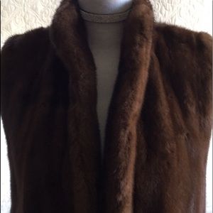 MINK VEST with garment bag, and two mink hats.